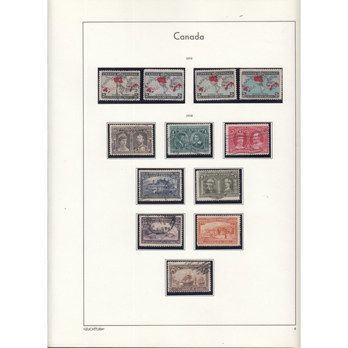 325 - A comprehensive mint & used collection of Canadian stamps housed in 2x illustrated Lighthouse volume... 