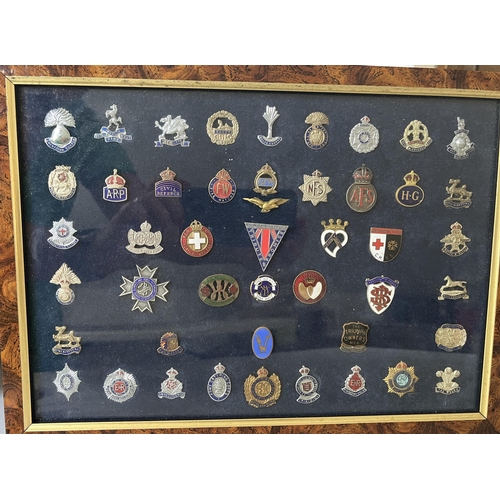 288 - A group of x65 Military Cap badges and Lapel Badges, including Royal Defence Corps, War Munition Vol... 