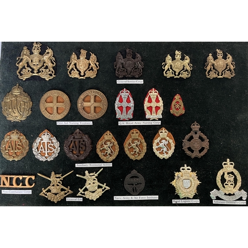 275 - A group of x24 British Military Corps, including Bakelite and Staybrite Cap Badges, noted First Aid ... 