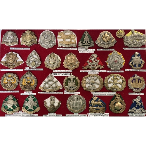 283 - A group of x70 British Military Cap Badges, including The South Wales Borderers, The Royal Welsh Fus... 