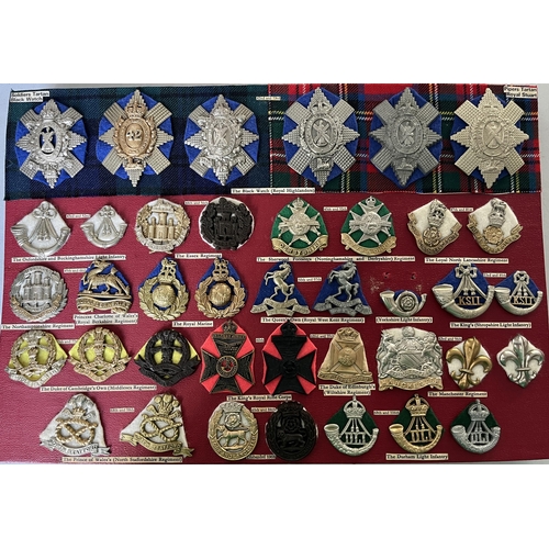 284 - A collection of x120 British Military Cap Badges including Bakelite and Staybrite examples, noted We... 