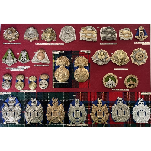 285 - A collection of x57 British Military Cap Badges including Bakelite and Staybrite examples, noted 21s... 