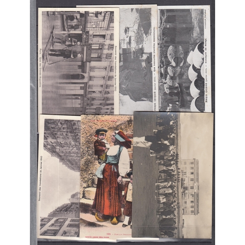600 - A collection of French postcards, mainly earlier Twentieth Century housed in 7 large Edwardian album... 
