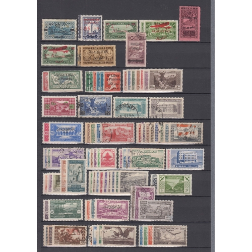 409 - A valuable mainly mint World collection of better singles and sets in a 32-page stock book, all peri... 