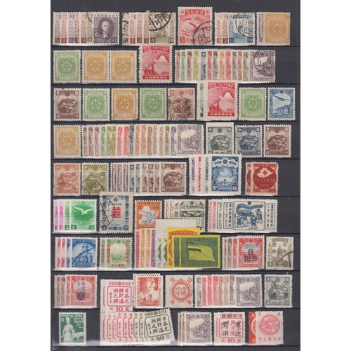 409 - A valuable mainly mint World collection of better singles and sets in a 32-page stock book, all peri... 