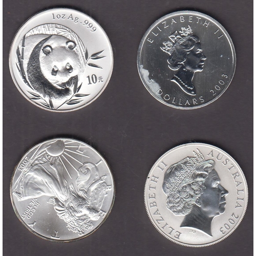 44 - A group of x4 2003 silver 1 Ounce coins, includes USA $1, Australia $1, Canada $5 and China 10 Yuan,... 