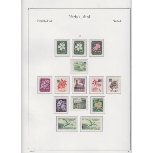 247 - A 6-volume mint and used collection of Pitcairn and Norfolk Islands stamps housed in 4x hingeless KA... 