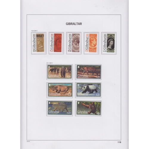 289 - A collection of Gibraltar mint stamps housed in 3x hingeless Davo albums bearing pages for issues 18... 