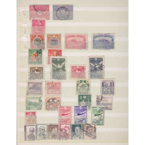 352 - A used duplicated Japanese stamp accumulation in x6 stock books, with a smattering of earlies, stren... 