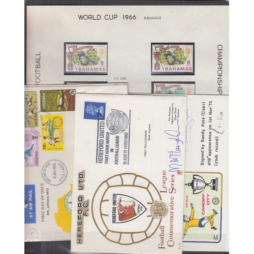 345 - A mint and used collection on Football stamps in four albums and in packets, including mint and used... 