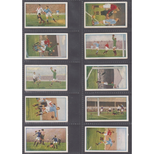 502 - A two-volume collection of mainly Football themed Cigarette cards, including 1934 Carreras Footballe... 