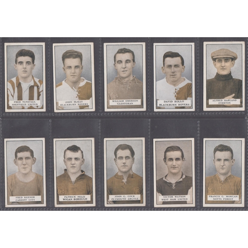 502 - A two-volume collection of mainly Football themed Cigarette cards, including 1934 Carreras Footballe... 