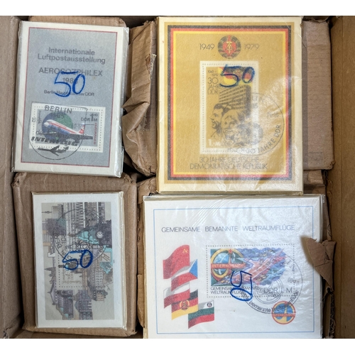 378 - A duplicated German DDR x8000 fine used ex dealer stock of x4 mini sheet issues, including 1979 SG E... 