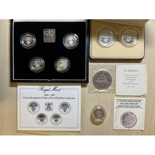 86 - A collection of x38 UK and Channel Island boxed proof and silver proof coins issued from the 1970s t... 