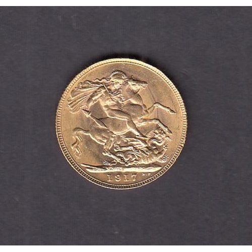 55 - UK 1917 gold full Sovereign, P Mint mark, enclosed in a mount, good condition