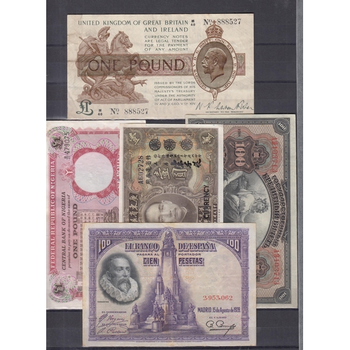 256 - A small group of x40 World banknotes, mainly circulated 20th Century notes, noted Malaya 1941 50c, C... 