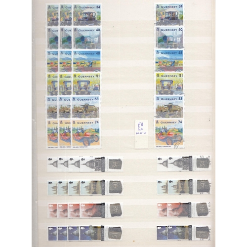 333 - An ex-dealers duplicated mint and used Guernsey stamp stock in x7 volumes, from 1941 to 2012, includ... 