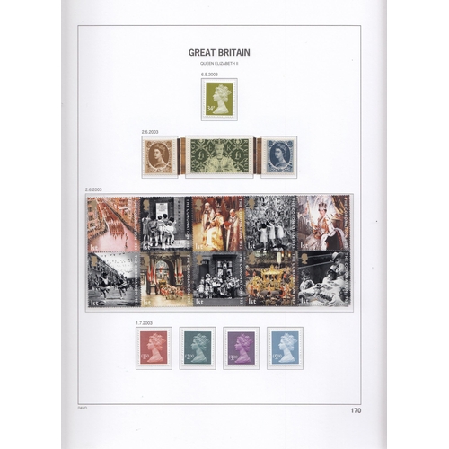 216 - An x8 volume mint and used GB stamp collection housed in Davo Lux albums, with a smattering of used ... 