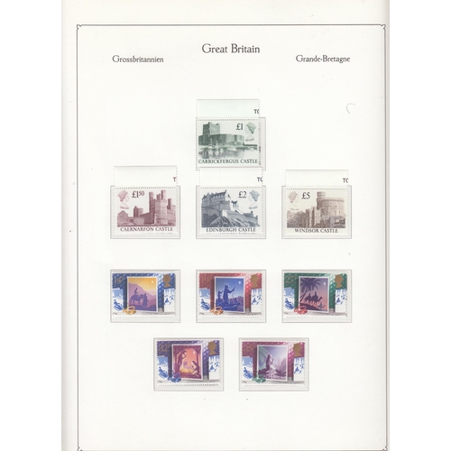 594 - A 2 volume mint u/m QEII stamp collection in KA-BE albums from 1971 to 1999 including Commemorative ... 