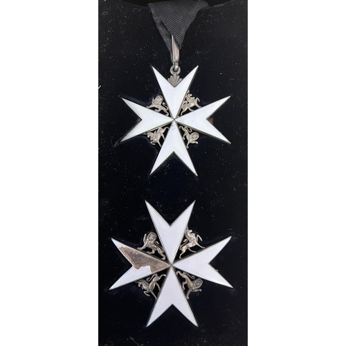 185 - A silver/gilt Neck Badge (missing a small piece enamel) and Star of a Knight of Grace of the Most Ve... 