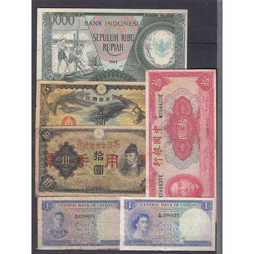 134 - A small collection of World 20th Century banknotes, strength in European and far east notes from the... 