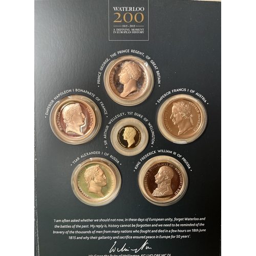 79 - A Waterloo medallic coin set includes 7g (14 Carat) gold completer, plus Nine Decades medallic set i... 