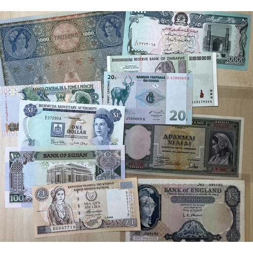 25 - A small accumulation of mainly 20th Century World banknotes, strength in UK QEII notes face £90, goo... 