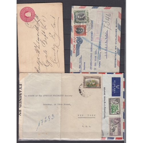 An envelope containing a World accumulation of postal history, mainly ...
