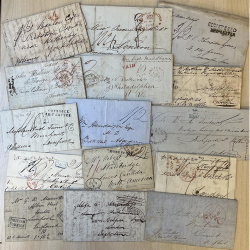 767 - A group of x50+ mainly 19th Century pre-stamp covers in and out of Great Britian, including Ship Let... 