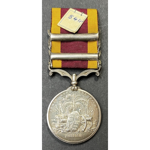 97 - UK 1861 Second China War Medal, 2 bar Canton 1857 & Taku Forts 1860, awarded to J.BACON. R.N., in go... 