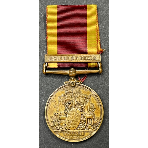 101 - UK 1900 China War Medal in bronze (3rd China), with Relief of Pekin bar, awarded to Gerrabo? Indisti... 