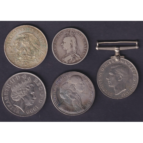 83 - A small World mainly 20th Century circulated coin collection in an album (many cleaned), noted a few... 