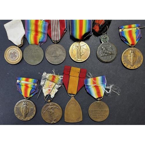 132 - A group of x15 medals all relating to WWI including Victory and War Medals, noted Belgium, France, U... 