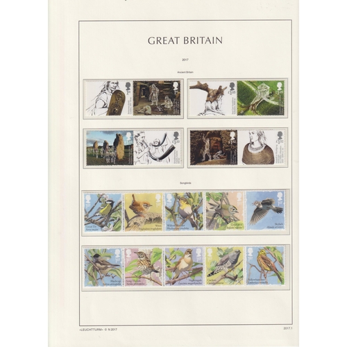 166 - A GB QEII mint stamp collection to 2023 in x8 volumes and loose, including Commemorative and Definit... 