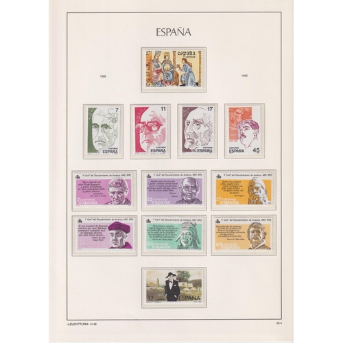 256 - A mint and used Spanish stamp collection in x12 albums, mainly mid period including sets and covers,... 