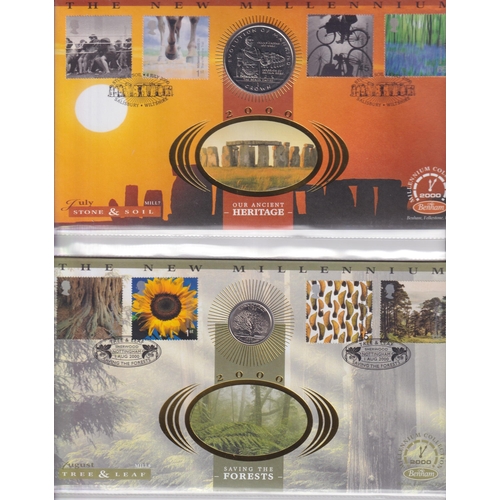 105 - A x2 volume Millenium coin cover collection produced by Benham, x25 coin covers from around the Worl... 