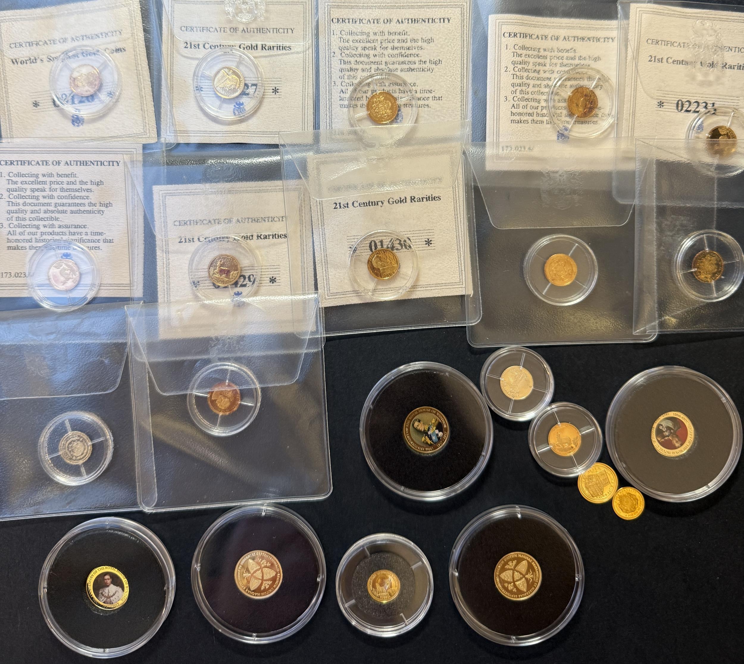 A group of x23 World miniature Gold 9kt coins, weight 14g, uncirculated