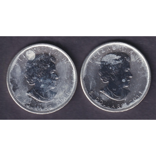 145 - A pair of Canada 2011 Brilliant Uncirculated Silver Maple Leaf $1 coins, each 1oz, struck in .9999 f... 