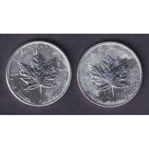 145 - A pair of Canada 2011 Brilliant Uncirculated Silver Maple Leaf $1 coins, each 1oz, struck in .9999 f... 