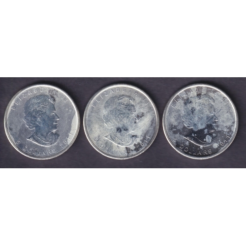 150 - A group of three Canada 2011 Brilliant Uncirculated Silver Maple Leaf $1 coins, each 1oz, struck in ... 