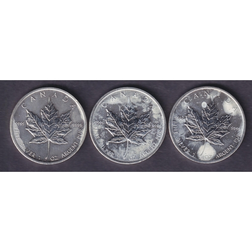 150 - A group of three Canada 2011 Brilliant Uncirculated Silver Maple Leaf $1 coins, each 1oz, struck in ... 