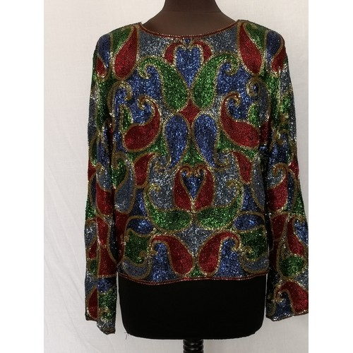 63 - Shimmering red, blue, green and gold hand embroidered heavily beaded jacket. Front open jacket, rela... 