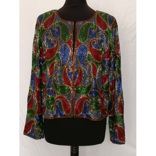 63 - Shimmering red, blue, green and gold hand embroidered heavily beaded jacket. Front open jacket, rela... 