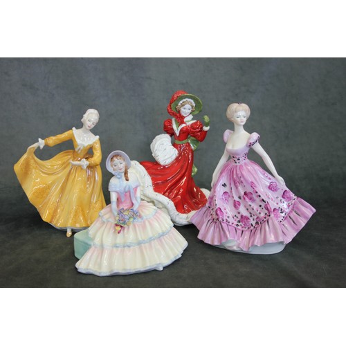 31 - A quantity of Royal Doulton and Coalport porcelain figures, including 