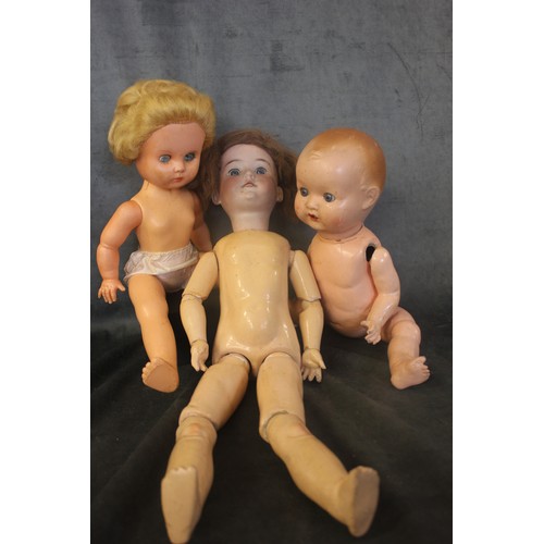 139 - An Armand Marseilles bisque head doll, mould No. 390, two further later general dolls, a small quant... 