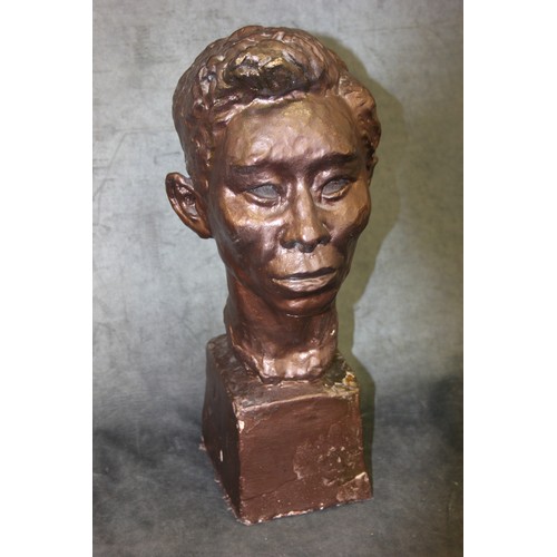 153 - A plaster bust, head of Japanese man, brown lacquer finish, 45cm high.