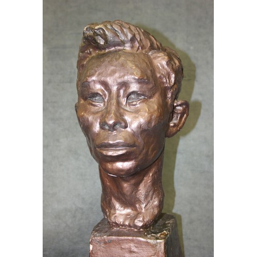 153 - A plaster bust, head of Japanese man, brown lacquer finish, 45cm high.