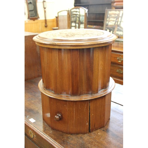 178 - A late Victorian mahogany concave sided cylinder commode with hinged lid and fitted a drawer below, ... 