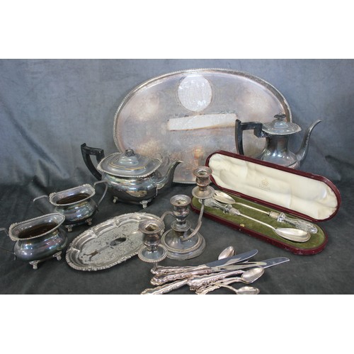 19 - A silver plated oval galleried tray, a four piece tea and coffee set, a pair of cased salad servers,... 