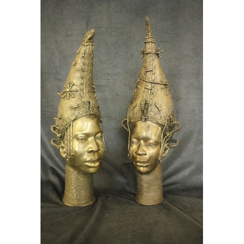 54 - Two Benin gilt bronze busts, heads of Ife Queens, each 63cm and 67cm high, respectively.